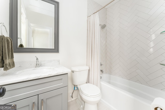 bathroom with vanity, shower / bath combo with shower curtain, and toilet