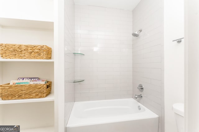 full bath featuring toilet and  shower combination
