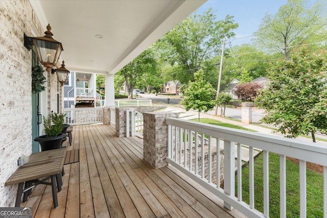 deck with covered porch