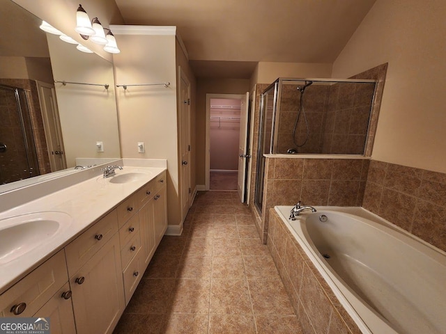 10856 Ellicot Way, Alpharetta, GA 30022 - full bathroom with a stall shower, a bath, a walk in closet, double vanity, and tile patterned floors