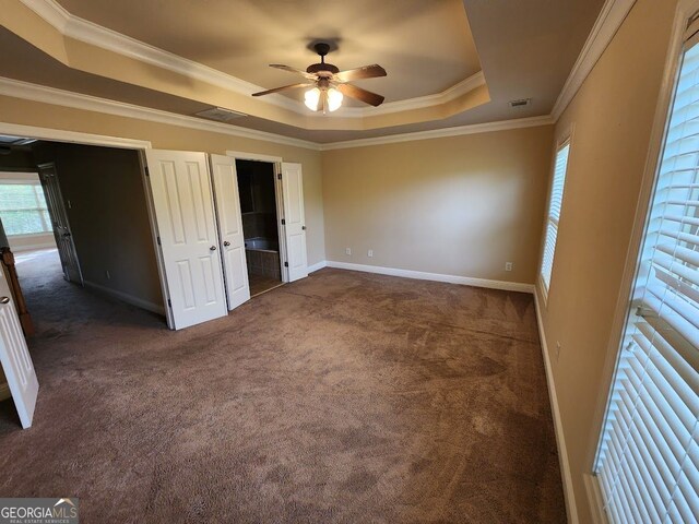 10856 Ellicot Way, Alpharetta, GA 30022 - unfurnished bedroom with a raised ceiling, carpet, baseboards, ornamental molding, and a ceiling fan