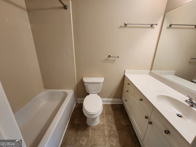 10856 Ellicot Way, Alpharetta, GA 30022 - full bath featuring toilet, baseboards, vanity, and washtub / shower combination