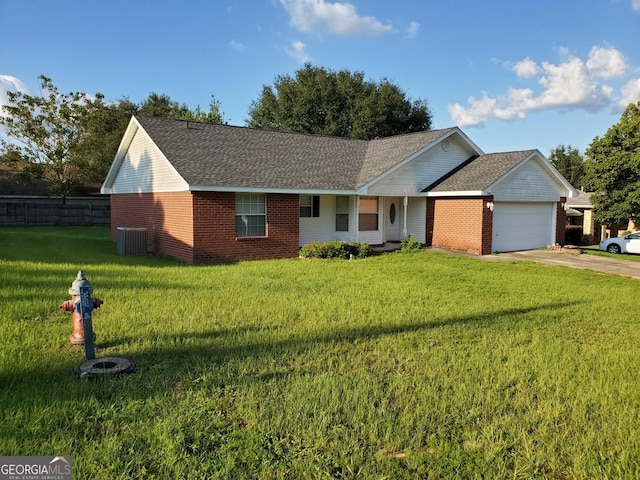 ranch-style house with an attached garage, concrete driveway, a front lawn, and brick siding