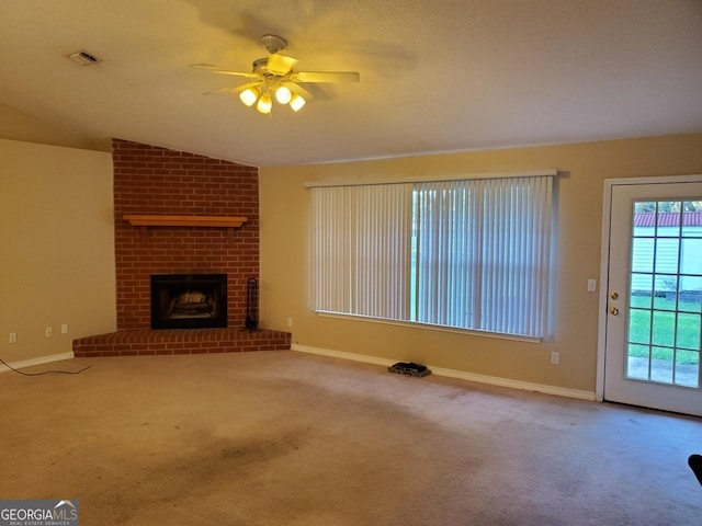 unfurnished living room with baseboards, a ceiling fan, carpet flooring, and visible vents