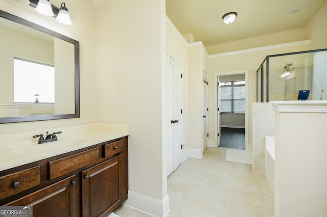 full bath with vanity, tile patterned floors, baseboards, a shower stall, and a bath