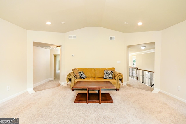 carpeted living room with baseboards, lofted ceiling, recessed lighting, and visible vents