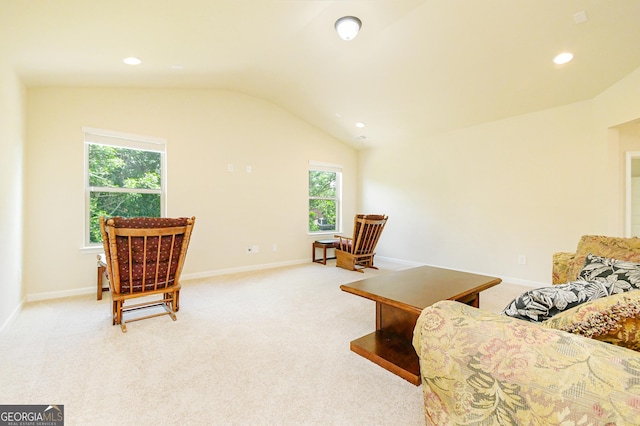 sitting room featuring light colored carpet, recessed lighting, and vaulted ceiling