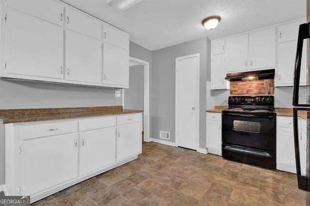 3929 Emerald Springs Ct, Decatur, GA 30035 - kitchen featuring baseboards, white cabinets, under cabinet range hood, and black range with electric cooktop