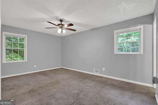 3929 Emerald Springs Ct, Decatur, GA 30035 - carpeted spare room with visible vents, a textured ceiling, baseboards, and ceiling fan