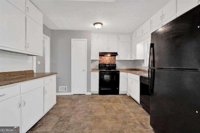 3929 Emerald Springs Ct, Decatur, GA 30035 - kitchen featuring visible vents, ventilation hood, white cabinetry, a sink, and black appliances
