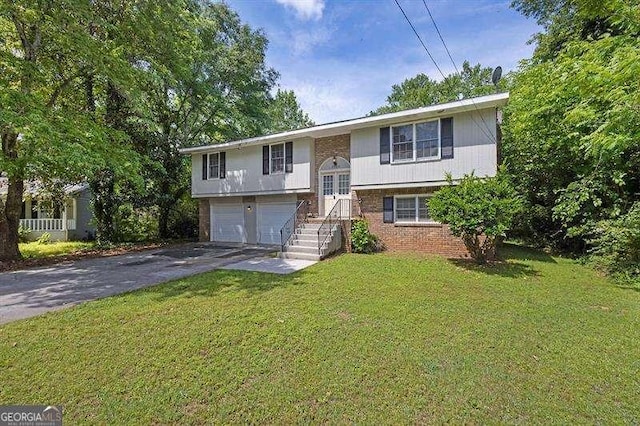 3929 Emerald Springs Ct, Decatur, GA 30035 - split foyer home with an attached garage, a front yard, driveway, and brick siding
