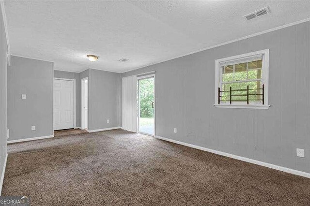 3929 Emerald Springs Ct, Decatur, GA 30035 - carpeted empty room featuring a textured ceiling, visible vents, and baseboards