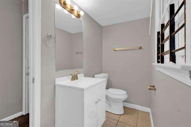3929 Emerald Springs Ct, Decatur, GA 30035 - bathroom featuring vanity, baseboards, tile patterned flooring, and toilet