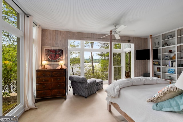 1006 Perrin Cove Rd, Tiger, GA 30576 - bedroom featuring carpet flooring, wooden walls, and a ceiling fan