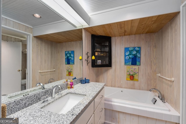 1006 Perrin Cove Rd, Tiger, GA 30576 - bathroom with wood walls, a bath, wooden ceiling, and vanity