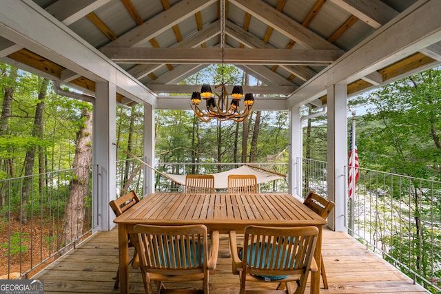 1006 Perrin Cove Rd, Tiger, GA 30576 - sunroom featuring a chandelier, vaulted ceiling, and view of scattered trees