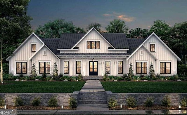 1560 Howell Bridge Rd, Ball Ground, GA 30107 - view of front of property with board and batten siding, french doors, and a front yard