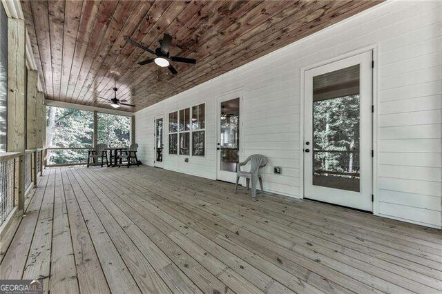 1560 Howell Bridge Rd, Ball Ground, GA 30107 - wooden terrace with ceiling fan