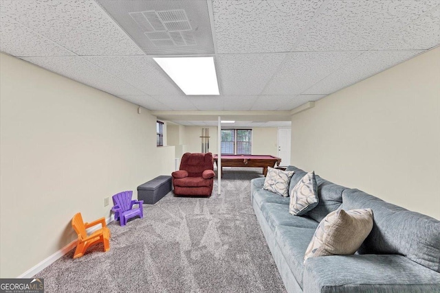 carpeted living room featuring baseboards, pool table, and a paneled ceiling