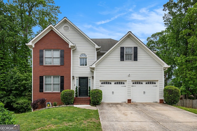 3073 Hopeland Dr, Powder Springs, GA 30127 - traditional-style house featuring concrete driveway, a garage, and brick siding