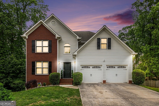 3073 Hopeland Dr, Powder Springs, GA 30127 - traditional-style home featuring concrete driveway, brick siding, and a garage