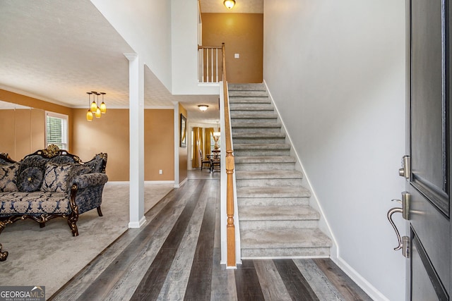 3073 Hopeland Dr, Powder Springs, GA 30127 - stairs featuring wood finished floors and baseboards