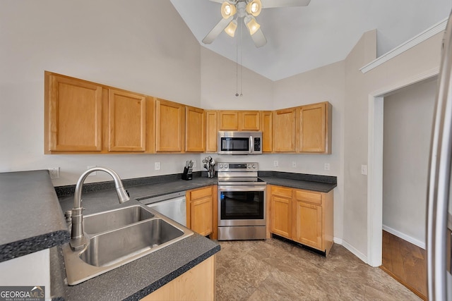 kitchen with a ceiling fan, dark countertops, high vaulted ceiling, a sink, and stainless steel appliances