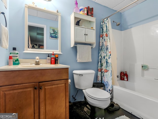 bathroom with vanity, shower / tub combo with curtain, and toilet