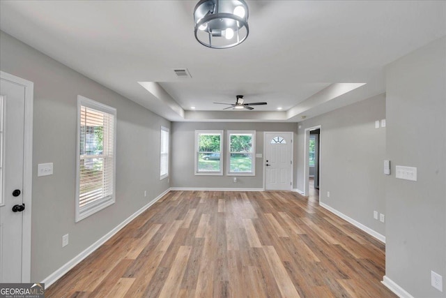 327 Peach Cir, Fort Valley, GA 31030 - entryway featuring a raised ceiling, light wood-type flooring, and ceiling fan