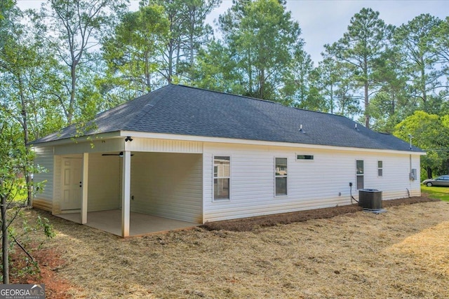 327 Peach Cir, Fort Valley, GA 31030 - back of house with a shingled roof, a patio, a ceiling fan, and an attached carport