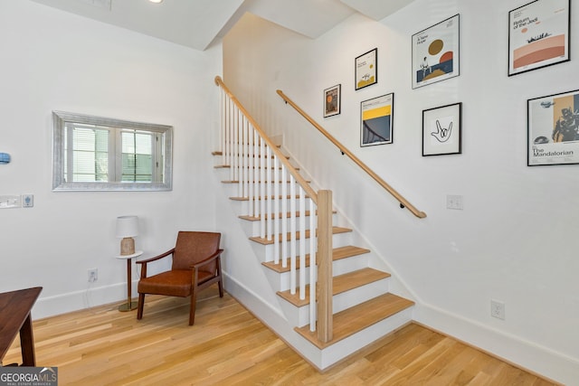 686 Exchange St SE, Atlanta, GA 30315 - stairway featuring baseboards and wood finished floors