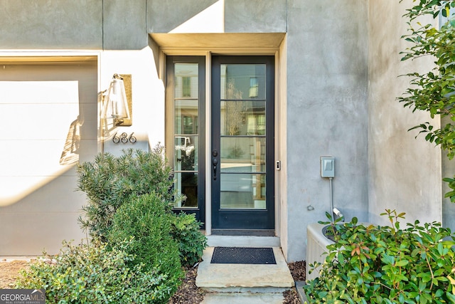 686 Exchange St SE, Atlanta, GA 30315 - doorway to property featuring stucco siding