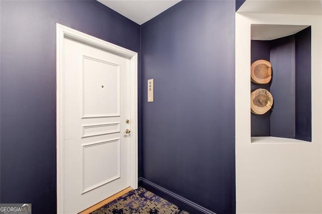199 14th St Unit 409, Atlanta, GA 30309 - doorway featuring baseboards