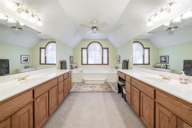 full bathroom featuring a sink, vaulted ceiling, and a ceiling fan