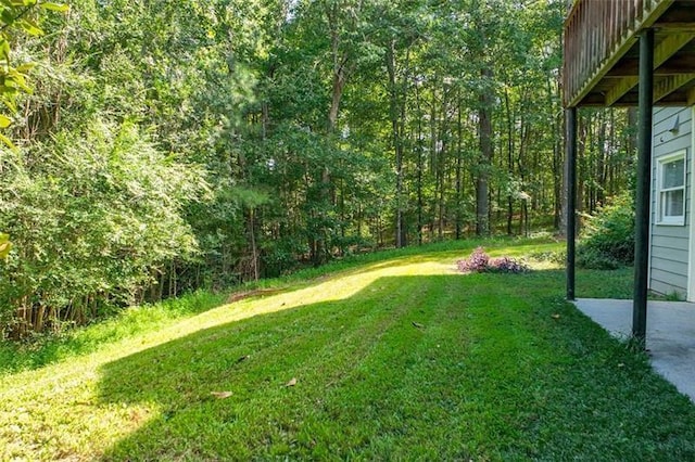 view of yard featuring a view of trees