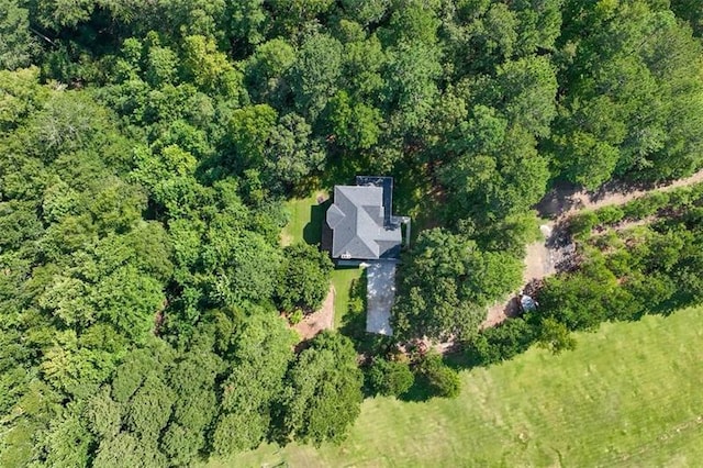 bird's eye view featuring a forest view