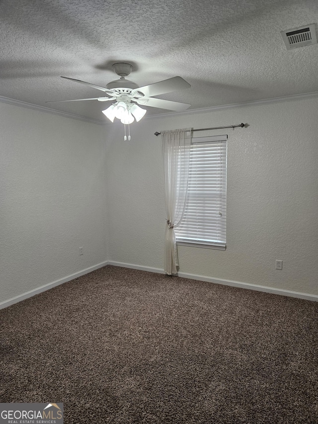 empty room with a textured ceiling, ceiling fan, visible vents, and carpet