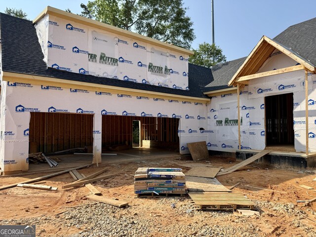 6996 Deaton Henry Rd, Flowery Branch, GA 30542 - view of side of property featuring stucco siding
