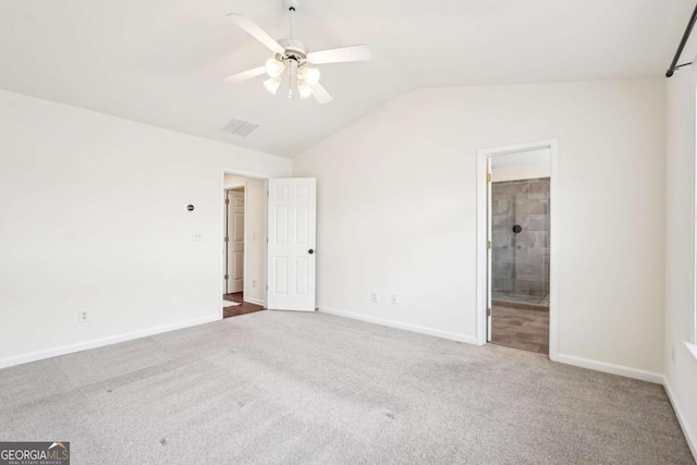 3505 Chattahoochee Summit Ln SE Unit 25, Atlanta, GA 30339 - unfurnished bedroom with vaulted ceiling, carpet, ensuite bath, and ceiling fan