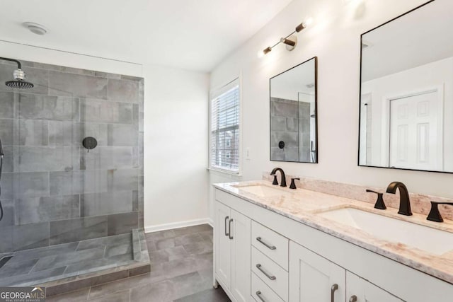3505 Chattahoochee Summit Ln SE Unit 25, Atlanta, GA 30339 - bathroom featuring double vanity and a tile shower