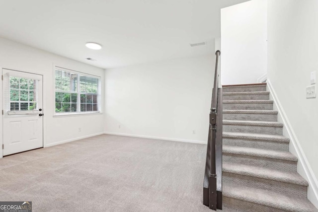 3505 Chattahoochee Summit Ln SE Unit 25, Atlanta, GA 30339 - staircase featuring carpet floors and baseboards