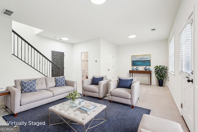 3505 Chattahoochee Summit Ln SE Unit 25, Atlanta, GA 30339 - living room with stairway, light colored carpet, and recessed lighting