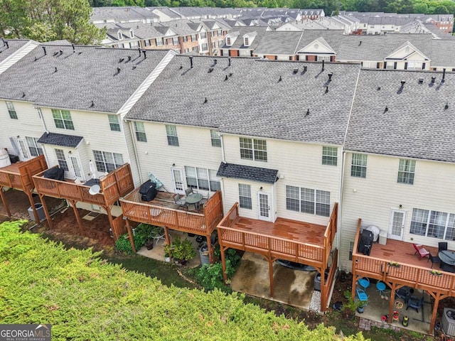 3505 Chattahoochee Summit Ln SE Unit 25, Atlanta, GA 30339 - back of house with a deck and a residential view