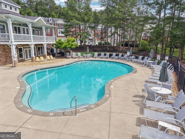 3505 Chattahoochee Summit Ln SE Unit 25, Atlanta, GA 30339 - community pool featuring french doors and a patio area