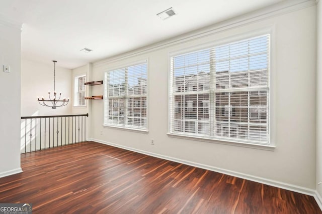 3505 Chattahoochee Summit Ln SE Unit 25, Atlanta, GA 30339 - spare room featuring a chandelier and wood finished floors