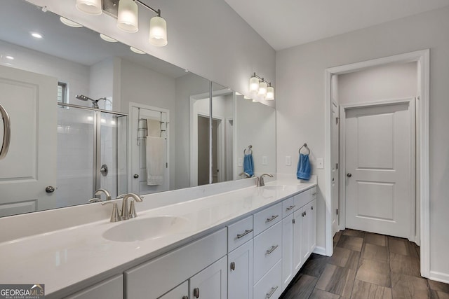 463 Marston Pass, Acworth, GA 30102 - bathroom with double vanity, recessed lighting, a sink, and a stall shower