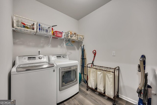 463 Marston Pass, Acworth, GA 30102 - washroom with laundry area, baseboards, wood finished floors, and separate washer and dryer