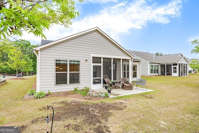 463 Marston Pass, Acworth, GA 30102 - rear view of house with a lawn, a patio area, and a sunroom
