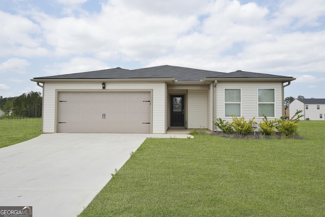 view of front facade with an attached garage, driveway, and a front yard