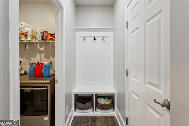 mudroom featuring wood finished floors, washer and dryer, and baseboards